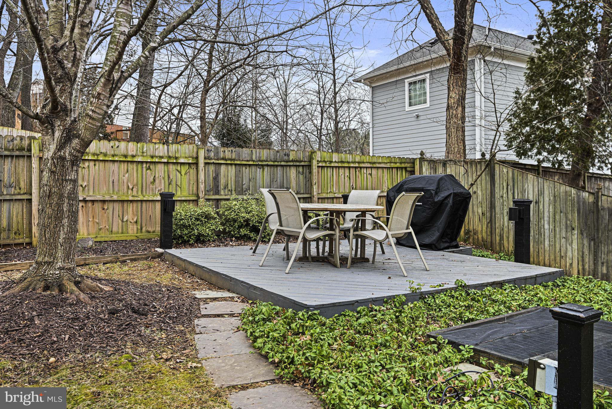 1905 Lamson Place McLean, VA 22101 - Photo 26 of 31 a view of a house with backyard and sitting area