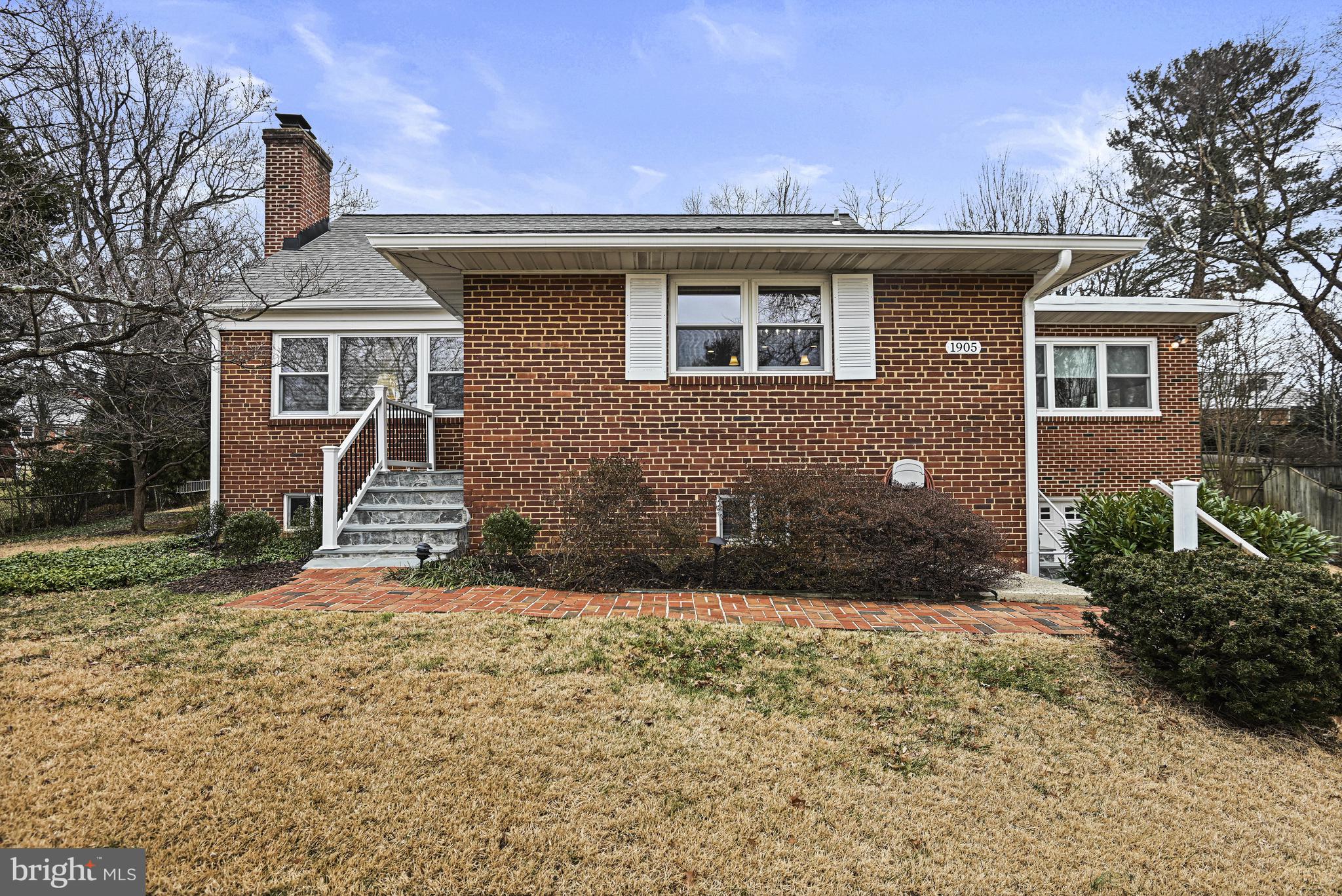 1905 Lamson Place McLean, VA 22101 - Photo 27 of 31 a front view of a house with a yard