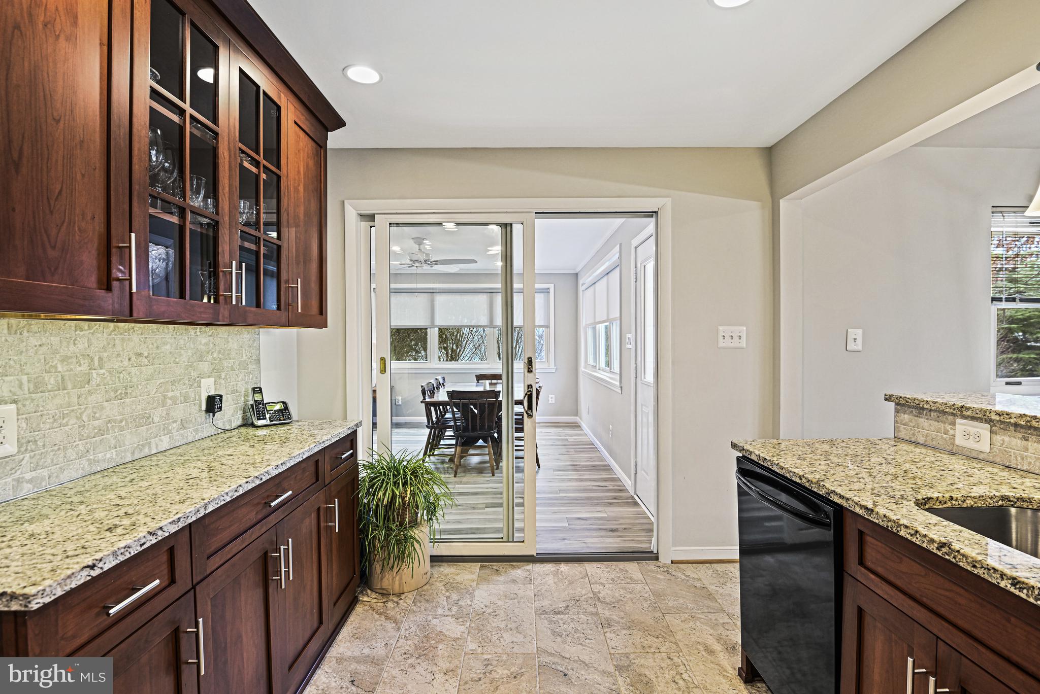 1905 Lamson Place McLean, VA 22101 - Photo 7 of 31 a spacious bathroom with a granite countertop double vanity sink a mirror and a bathtub