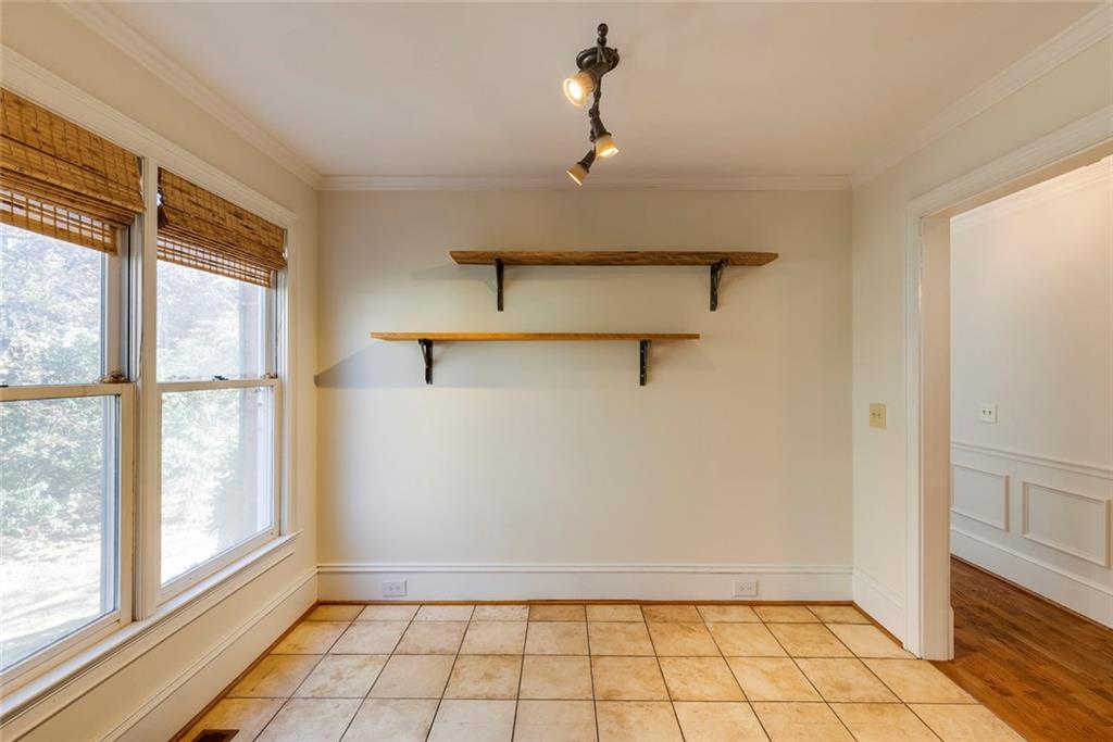 5377 Trentham Drive Dunwoody, GA 30338 - Photo 15 of 51 a view of an empty room with a window