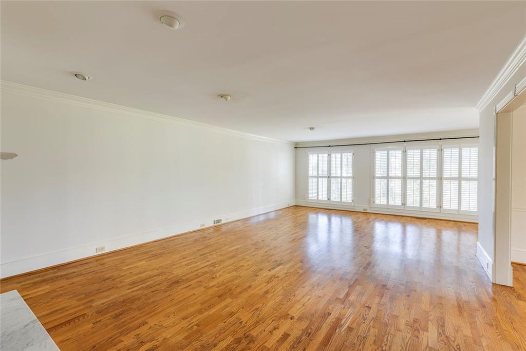 5377 Trentham Drive Dunwoody, GA 30338 - Photo 28 of 51 wooden floor in an empty room with a window