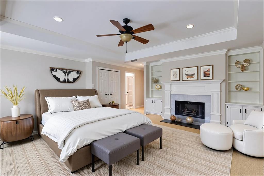 5377 Trentham Drive Dunwoody, GA 30338 - Photo 38 of 51 a bedroom with a bed and a fireplace