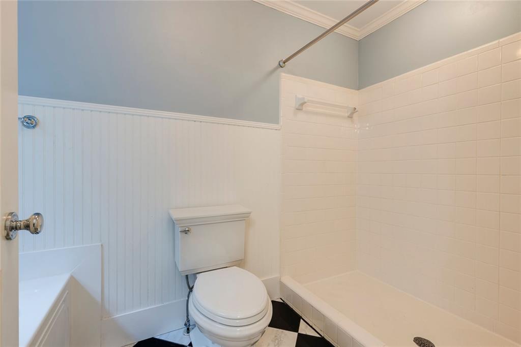 5377 Trentham Drive Dunwoody, GA 30338 - Photo 40 of 51 a white toilet sitting next to a white sink and vanity