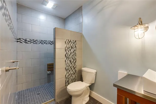 a view of a livingroom with closet and cabinet