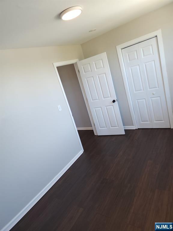 21 Ave D, Unit 2 Lodi, NJ 07644 - Photo 5 of 7 an entryway view with staircase