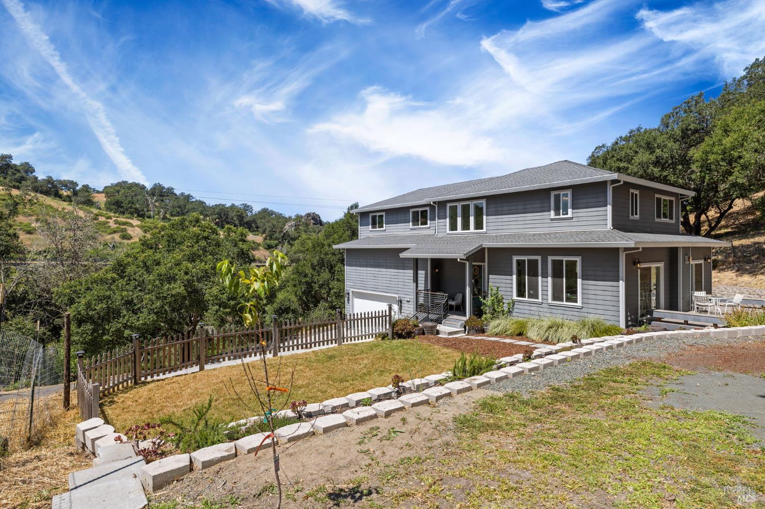 3805 Porter Creek Road Santa Rosa, CA 95404 - Photo 1 of 1 a front view of a house with swimming pool