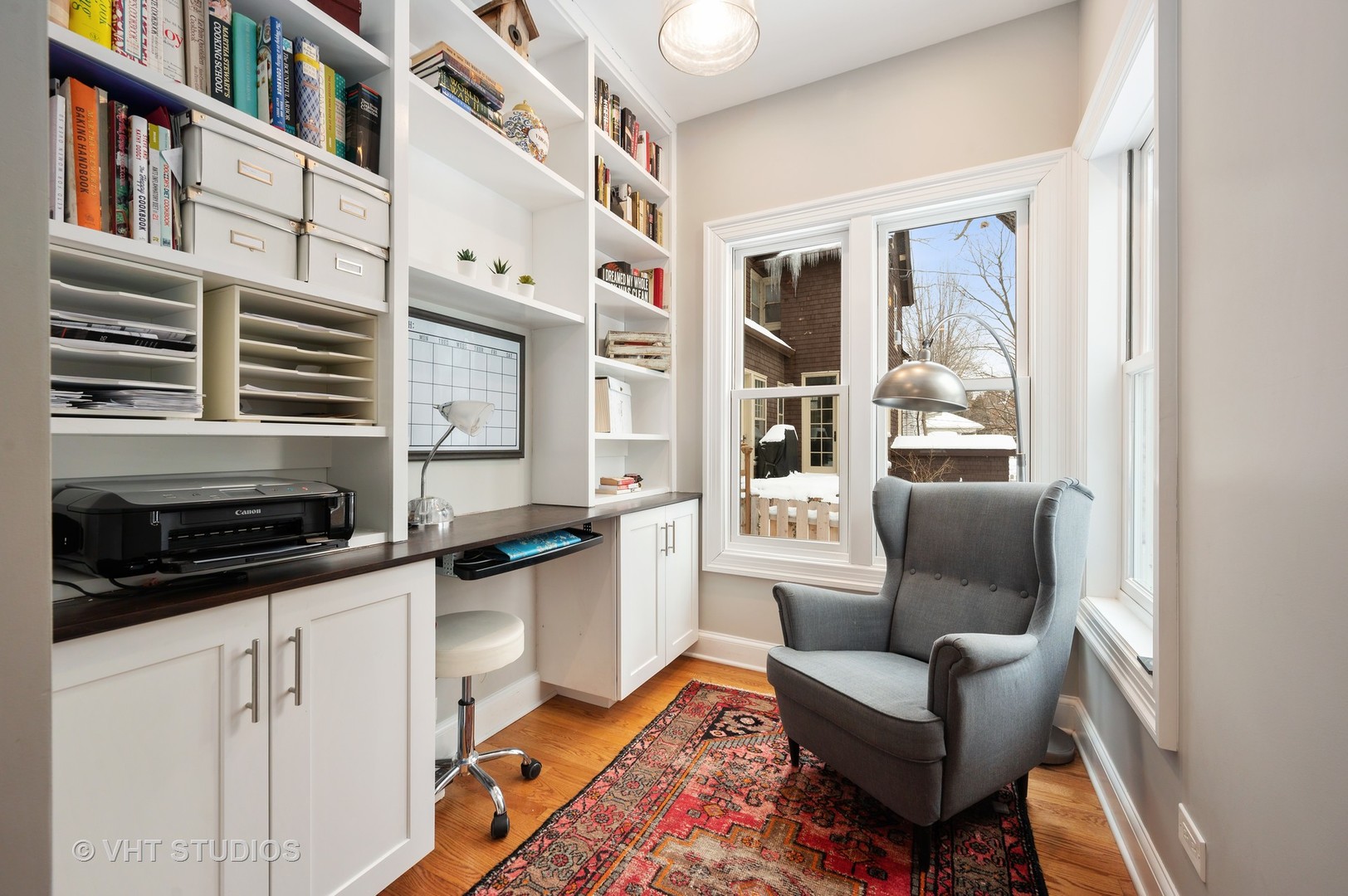 1031 Maple Avenue Evanston, IL 60202 - Photo 21 of 54 a living room with furniture a rug and a window