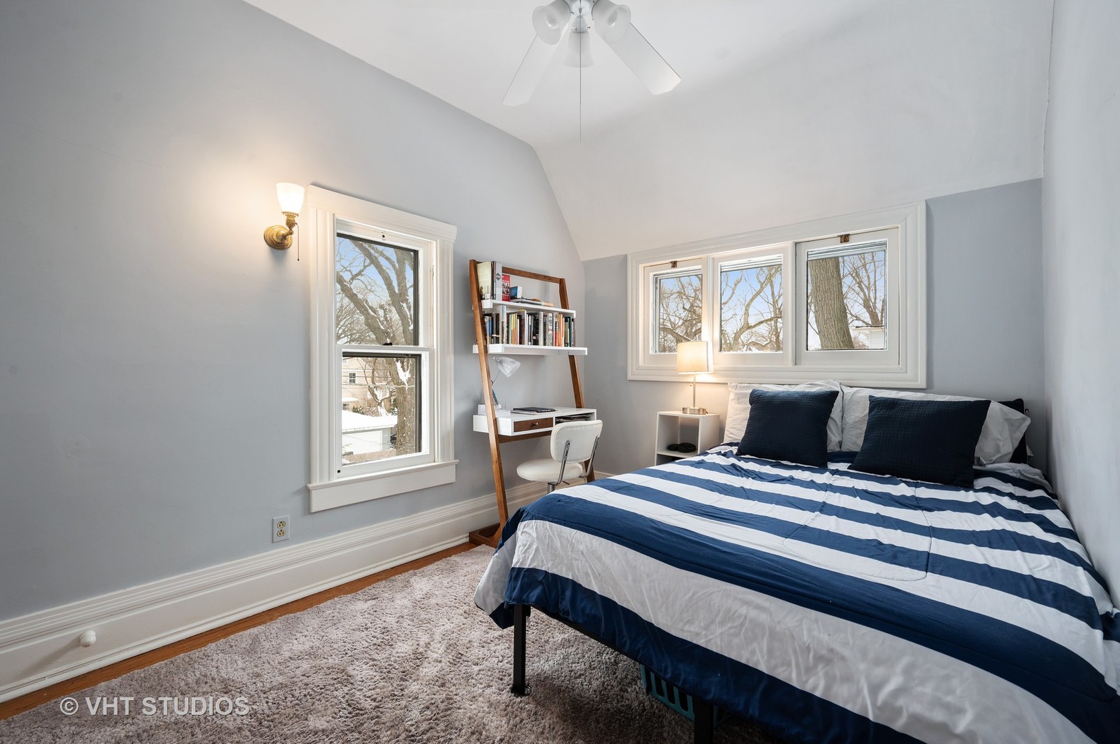 1031 Maple Avenue Evanston, IL 60202 - Photo 35 of 54 a bedroom with a bed and a window