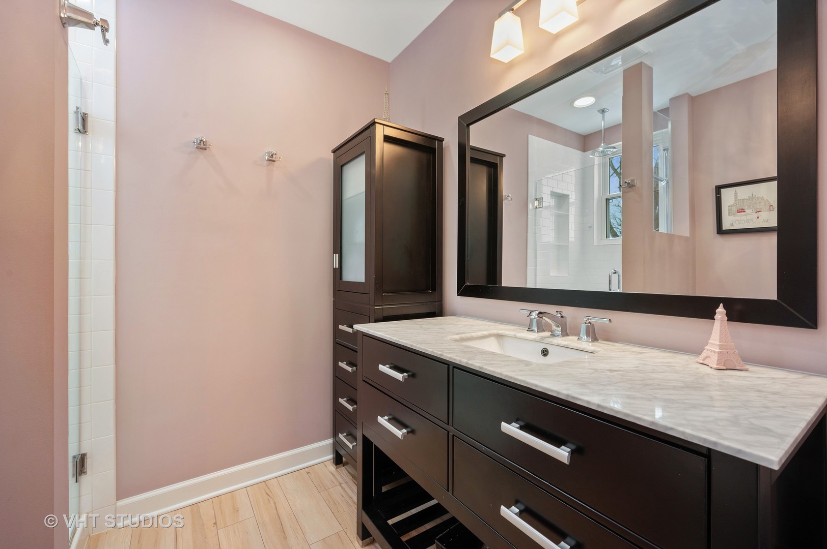 1031 Maple Avenue Evanston, IL 60202 - Photo 41 of 54 a bathroom with a double vanity sink and mirror