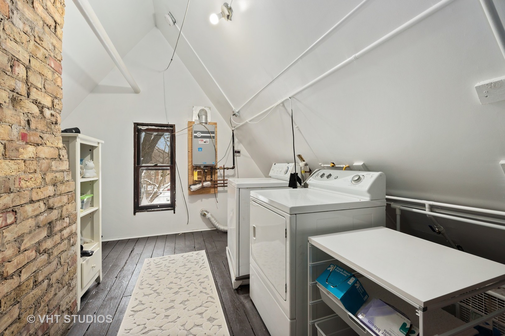 1031 Maple Avenue Evanston, IL 60202 - Photo 43 of 54 a room with a washer and dryer