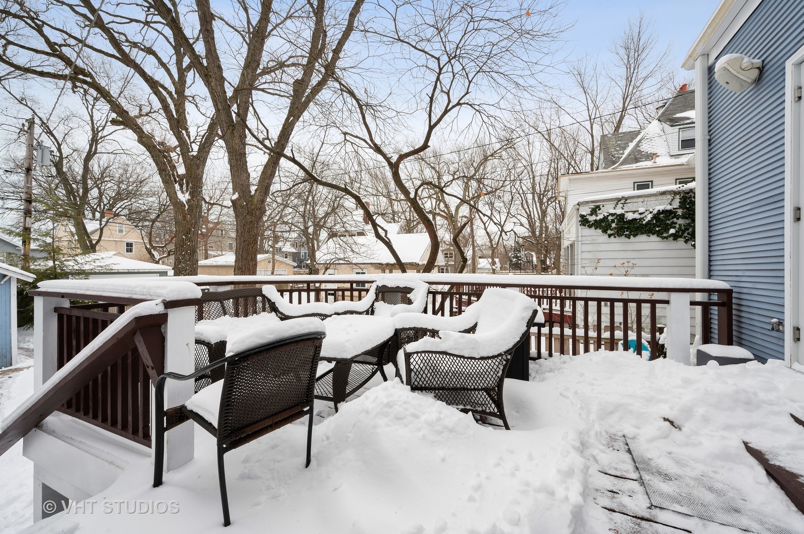 1031 Maple Avenue Evanston, IL 60202 - Photo 48 of 54 a roof deck with table and chairs