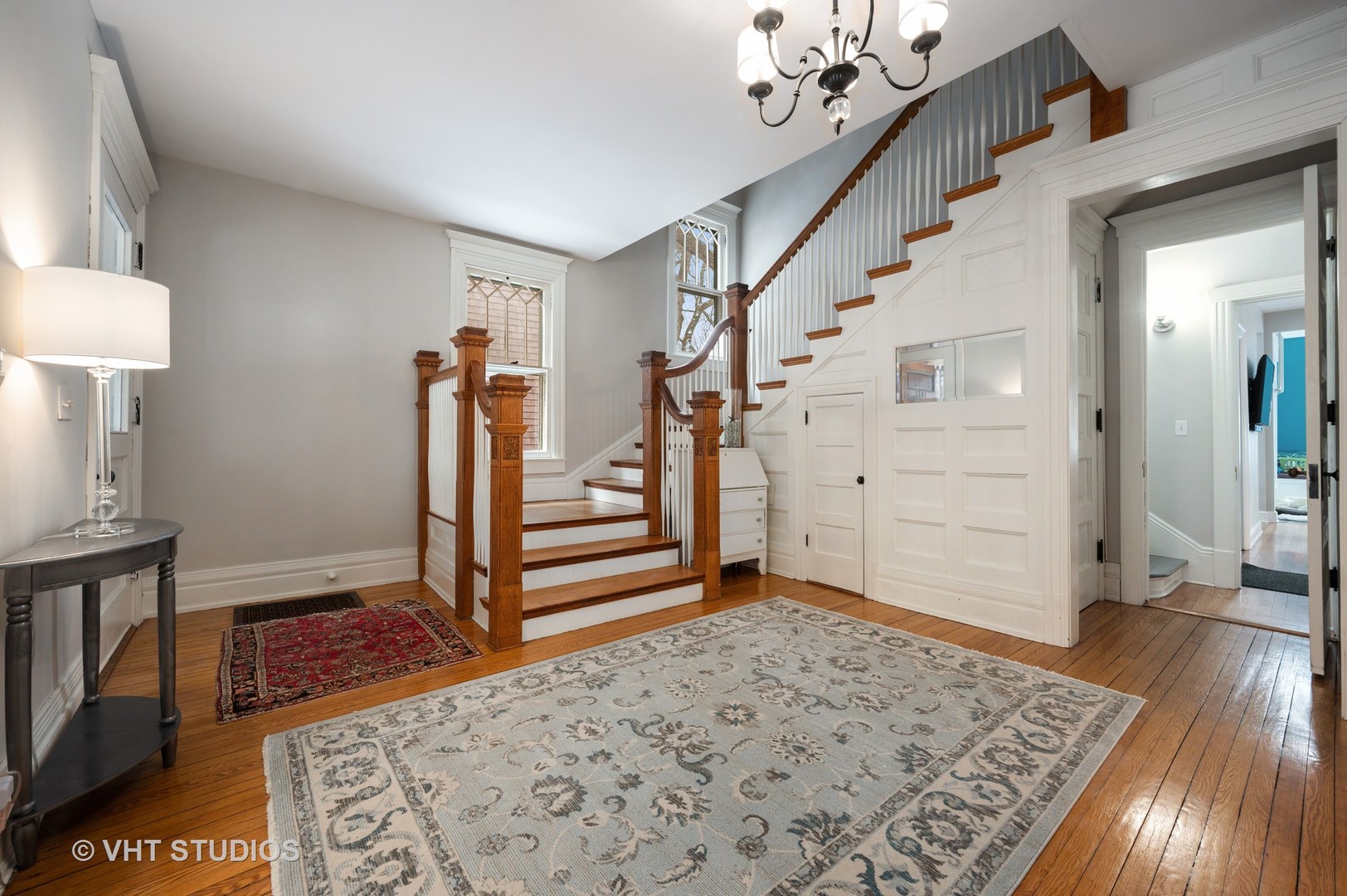 1031 Maple Avenue Evanston, IL 60202 - Photo 7 of 54 wooden floor with an entryway