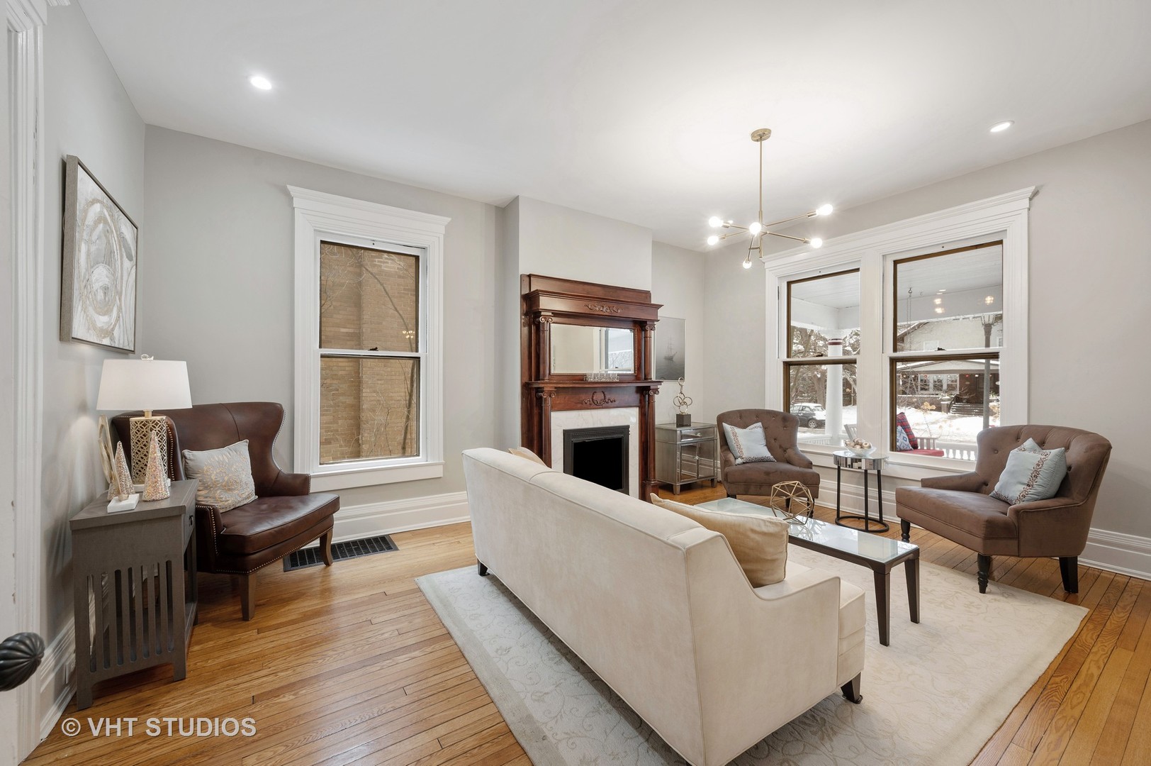 1031 Maple Avenue Evanston, IL 60202 - Photo 8 of 54 a living room with fireplace furniture and a flat screen tv