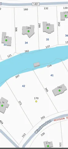 a backyard of a house with lots of trees