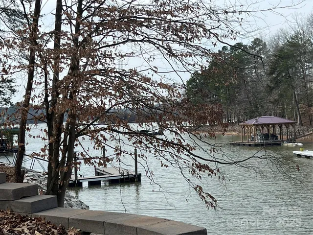 a view of a lake with a garden