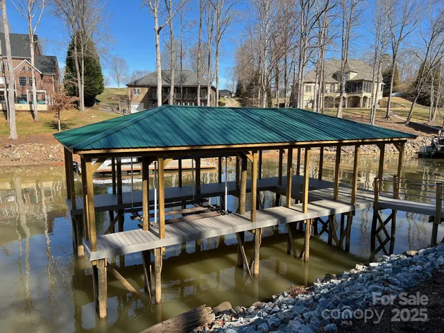 a view of pool with outdoor seating