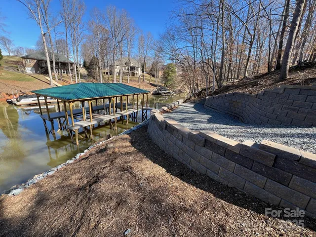 a view of a swimming pool with a lounge chairs