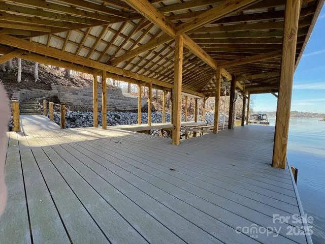 a view of swimming pool with seating space