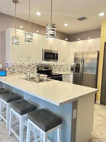 $495,000 | 2703 Northwest 55th Avenue, Pompano Beach, FL 33063