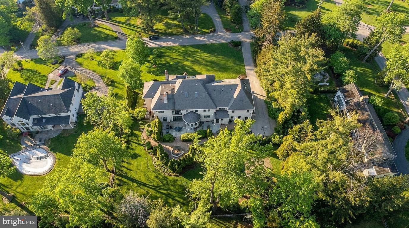 621 Great Springs Road Bryn Mawr, PA 19010 - Photo 4 of 102 Lush estate nestled in vibrant greenery.