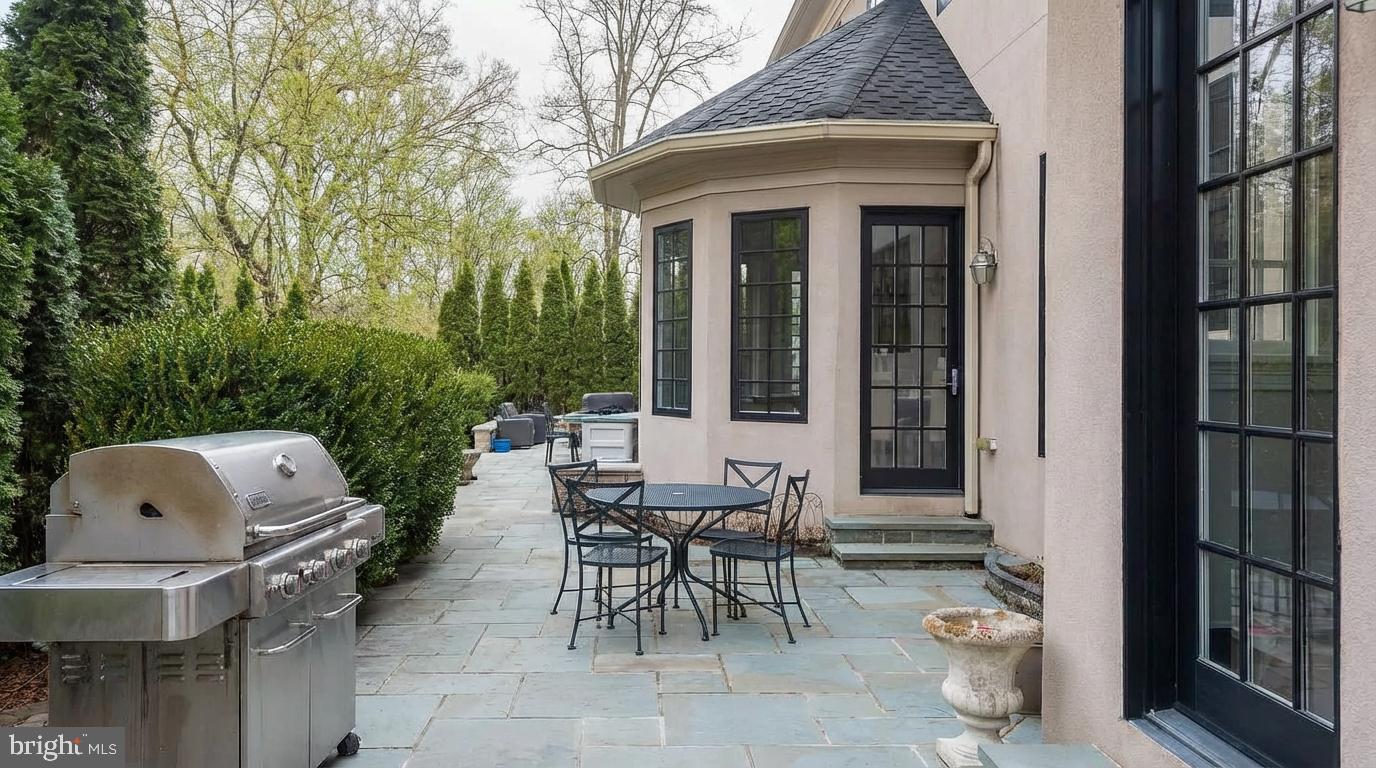 621 Great Springs Road Bryn Mawr, PA 19010 - Photo 95 of 102 Charming patio with lush greenery.