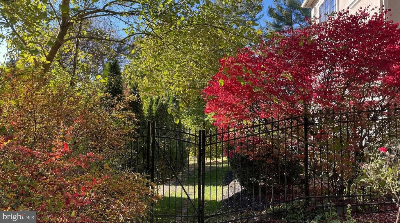 621 Great Springs Road Bryn Mawr, PA 19010 - Photo 99 of 102 Charming garden gate in autumn hues.