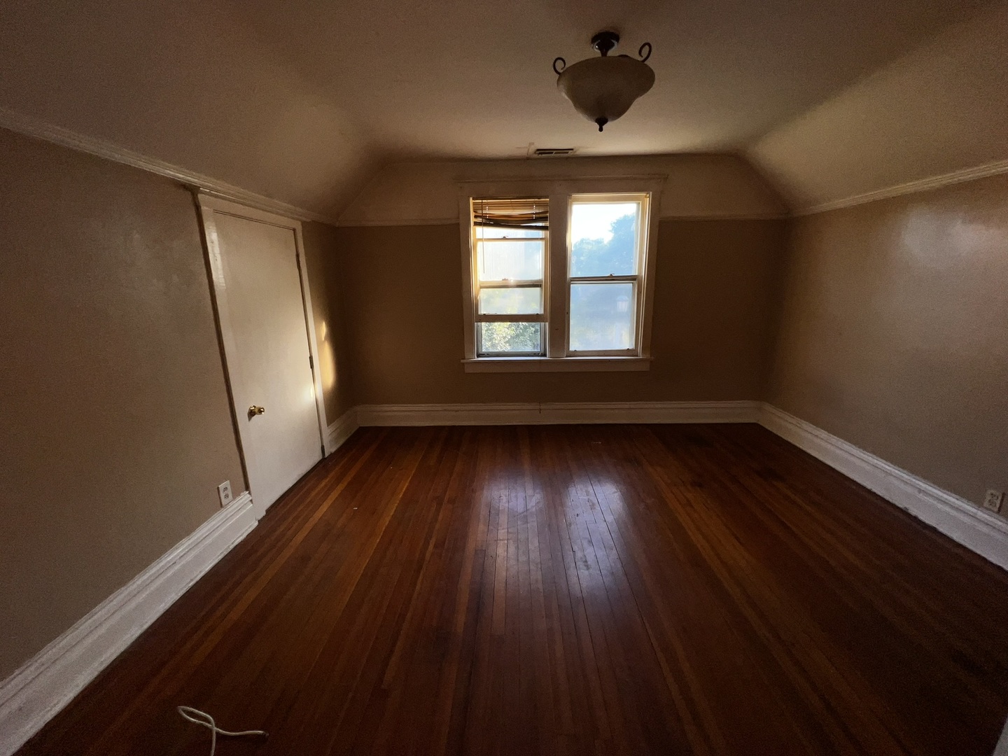 1511 Greenleaf Street Evanston, IL 60202 - Photo 18 of 37 wooden floor in an empty room with a window