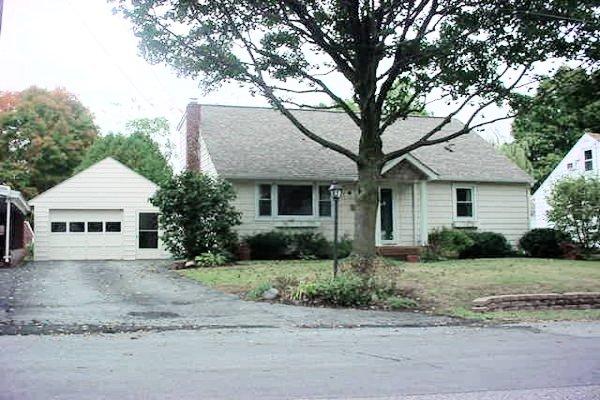 a view of a yard in front of a house