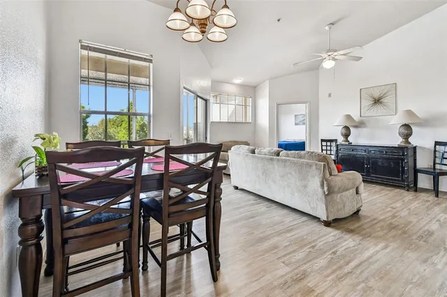 a front view of a building with a garden