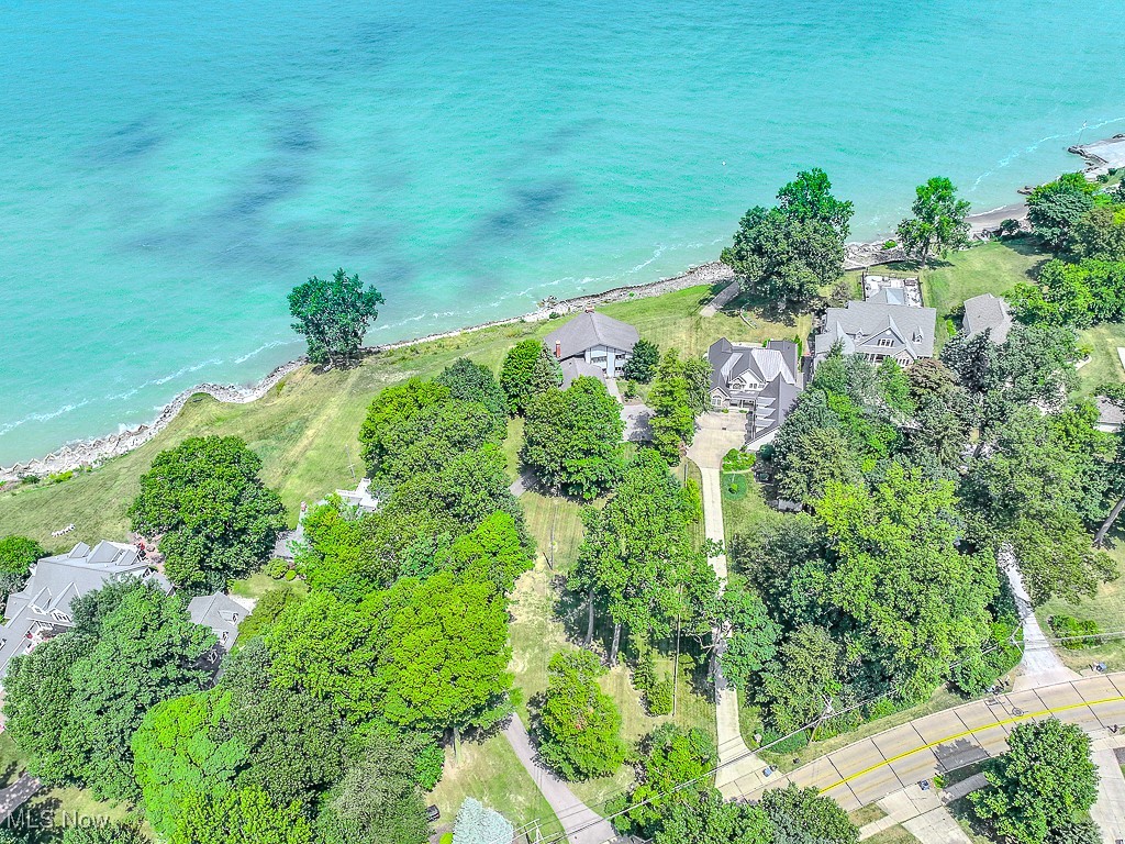 7563 Salida Road Mentor, OH 44060 - Photo 5 of 48 Aerial view of property and surrounding area featuring a large body of water and nearby suburban area