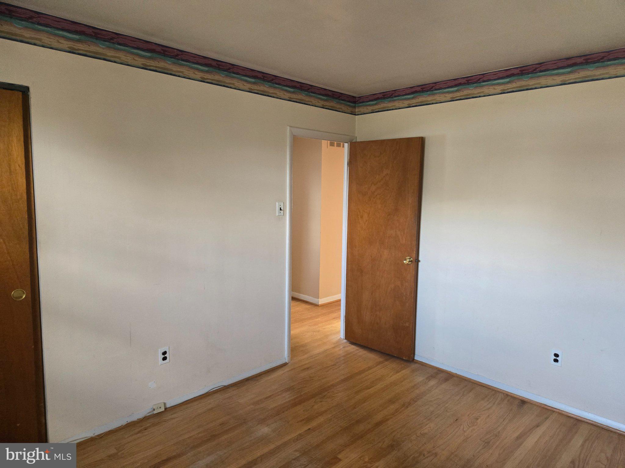402 Georgetown Road Blackwood, NJ 08012 - Photo 11 of 11 a view of an empty room with wooden floor