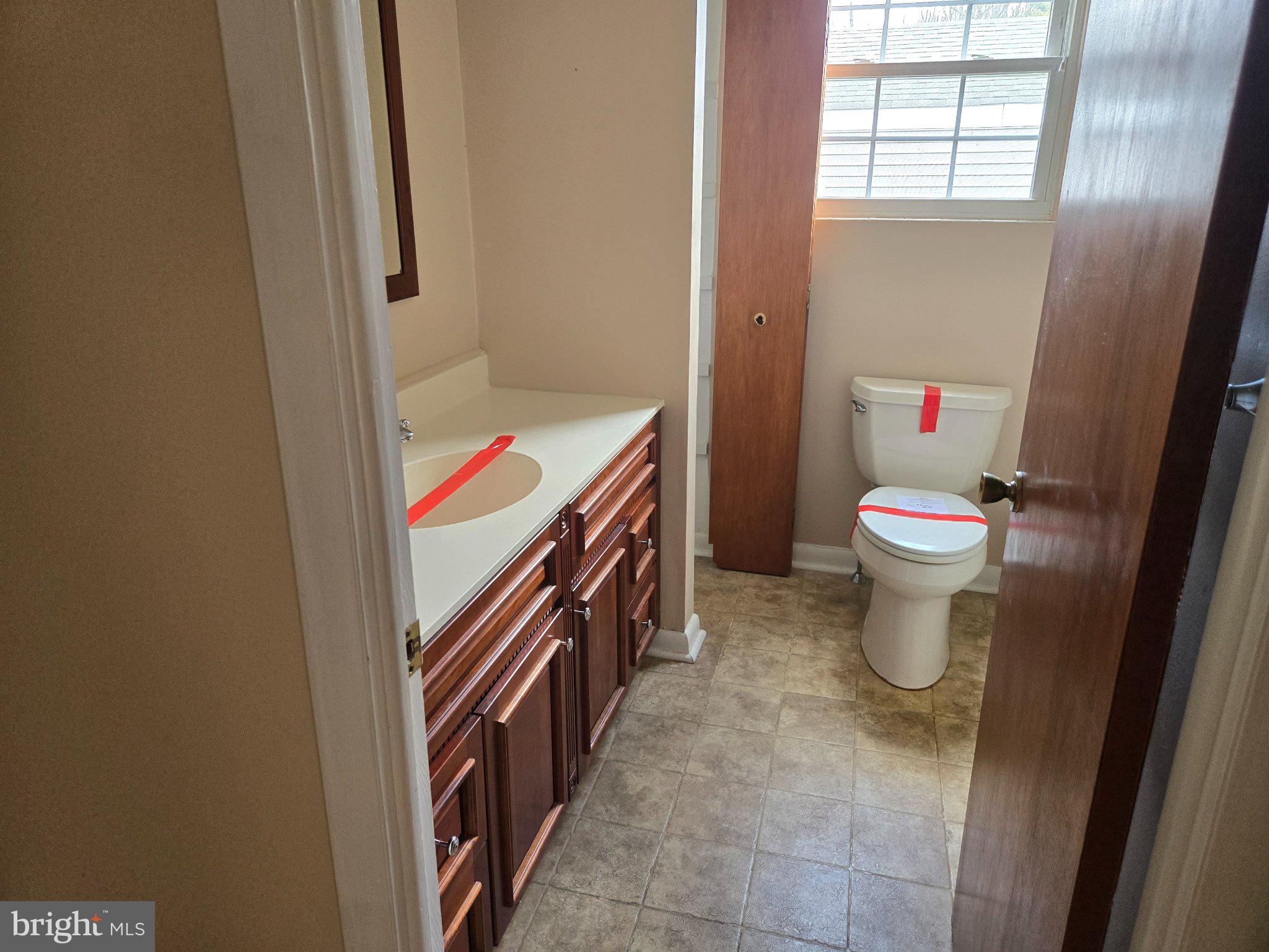 402 Georgetown Road Blackwood, NJ 08012 - Photo 6 of 11 a bathroom with a toilet sink and mirror