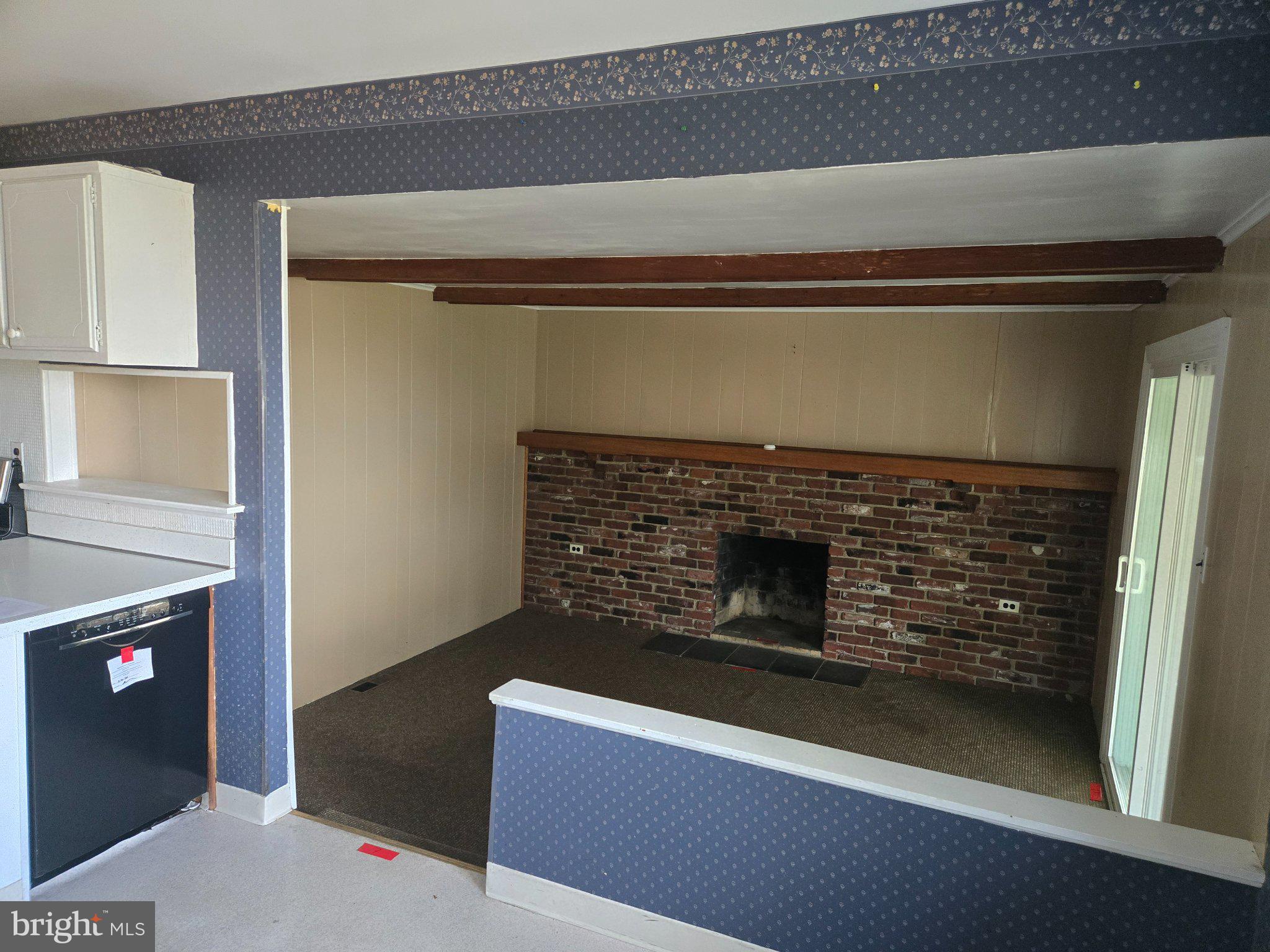 402 Georgetown Road Blackwood, NJ 08012 - Photo 7 of 11 a living room with a fireplace