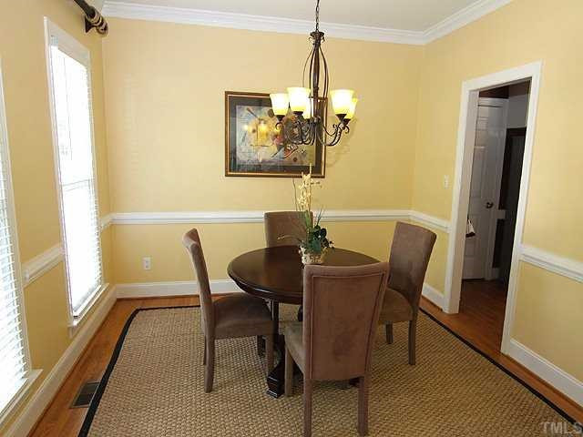 1909 Capers Court Raleigh, NC 27612 - Photo 4 of 15 Bright and spacious Dining room with hardwood floors. Dining Room
