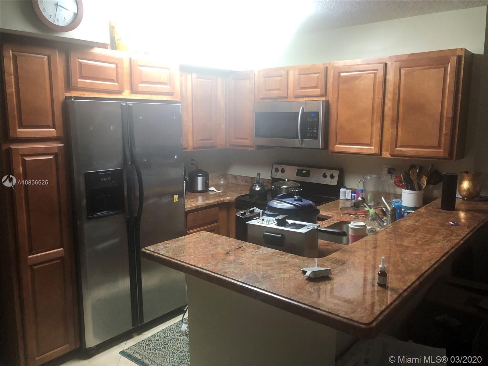 831 Lyons Road, Unit 23103 Coconut Creek, FL 33063 - Photo 17 of 21