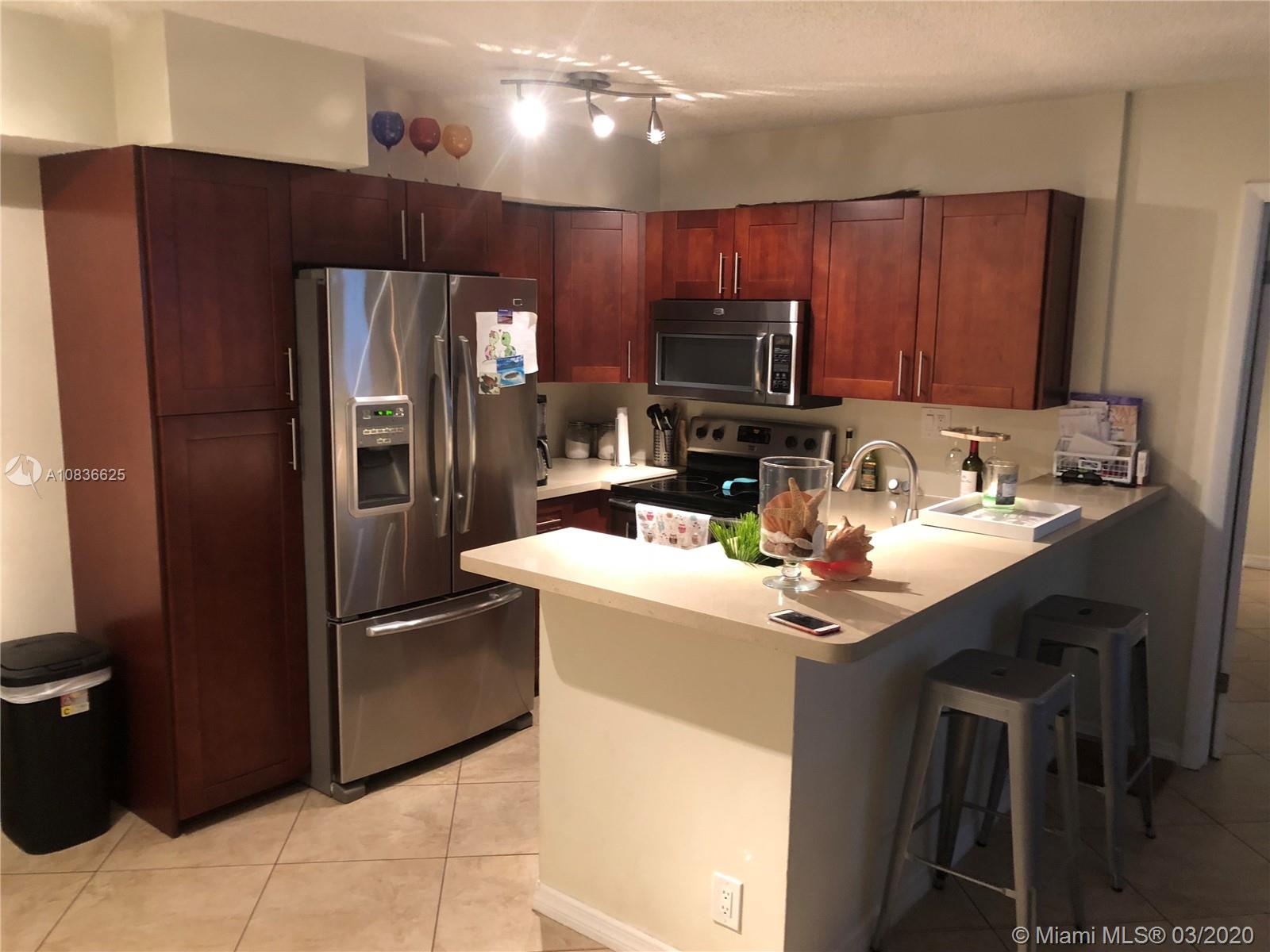 831 Lyons Road, Unit 23103 Coconut Creek, FL 33063 - Photo 6 of 21