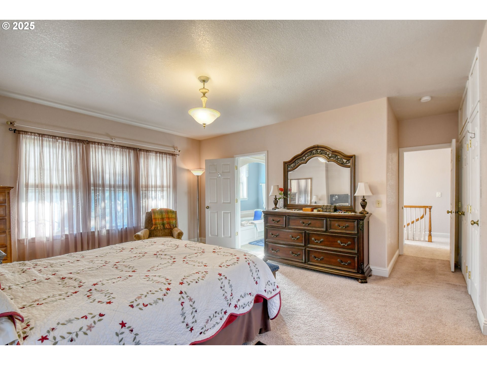 310 East Washington Street Athena, OR 97813 - Photo 18 of 45 a bedroom with a bed and a dresser