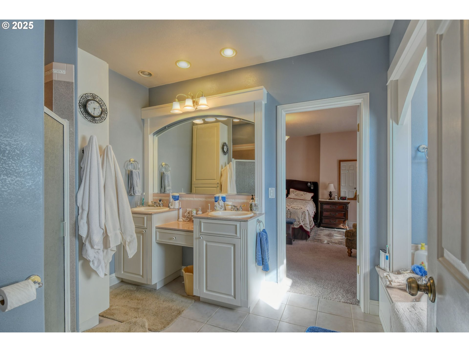 310 East Washington Street Athena, OR 97813 - Photo 19 of 45 a bathroom with a sink mirror and a toilet