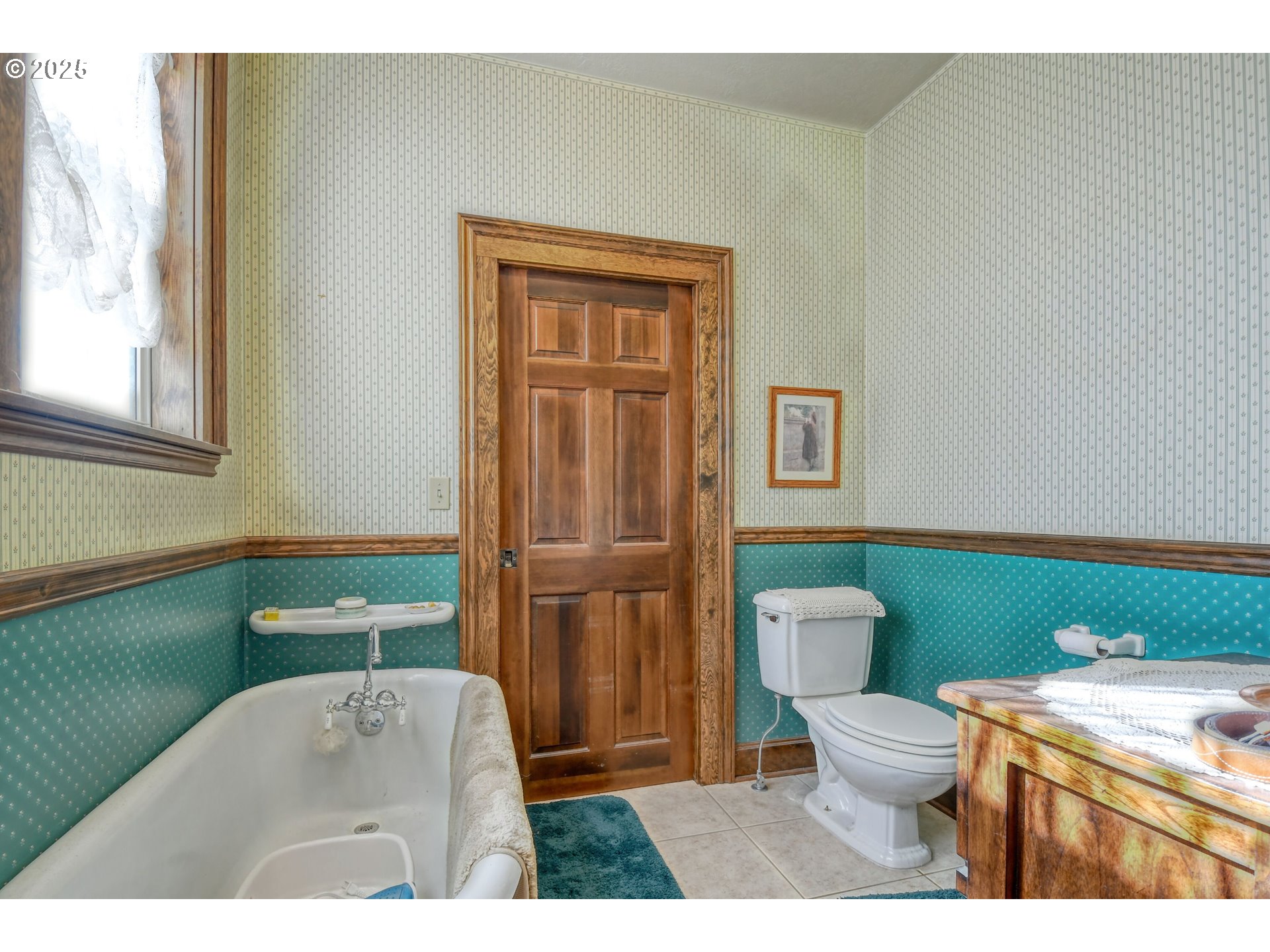 310 East Washington Street Athena, OR 97813 - Photo 33 of 45 a bathroom with a toilet sink and mirror
