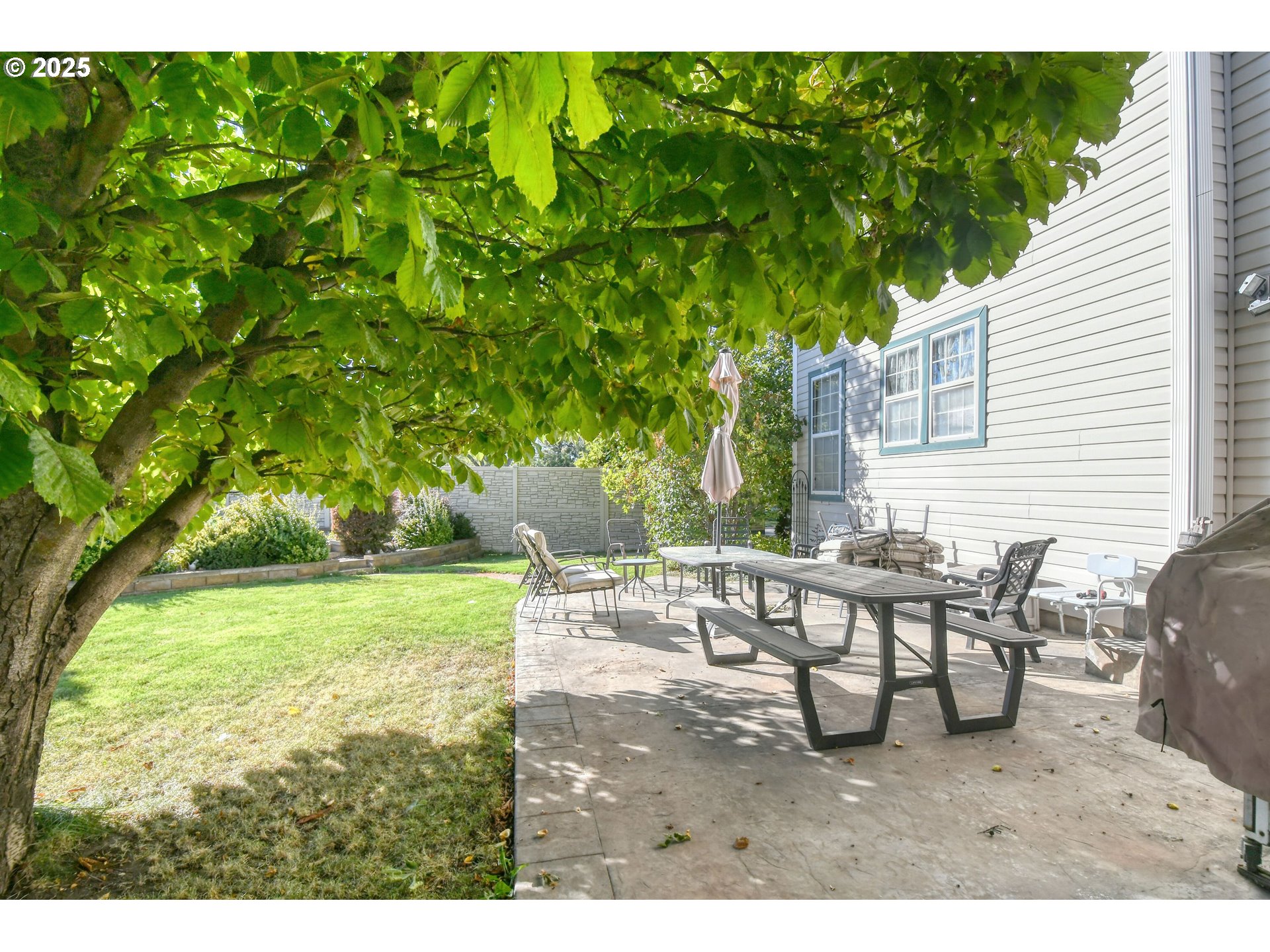 310 East Washington Street Athena, OR 97813 - Photo 40 of 45 a view of a yard with furniture and a garden
