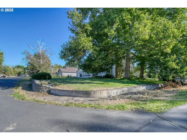 a view of a road with a yard
