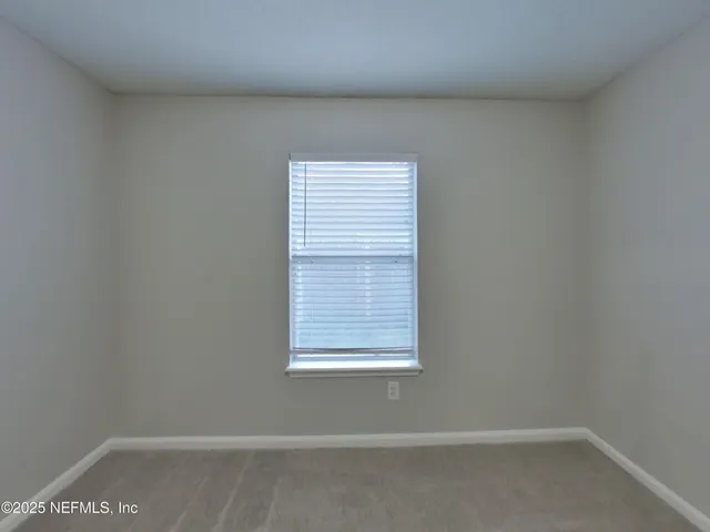 a view of a small space with a window