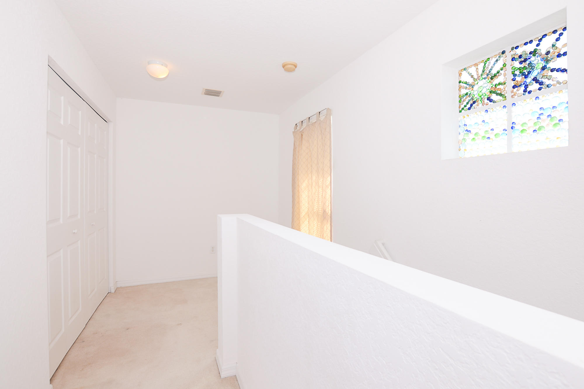 9434 Windrift Circle Fort Pierce, FL 34945 - Photo 15 of 37 Laundry doors