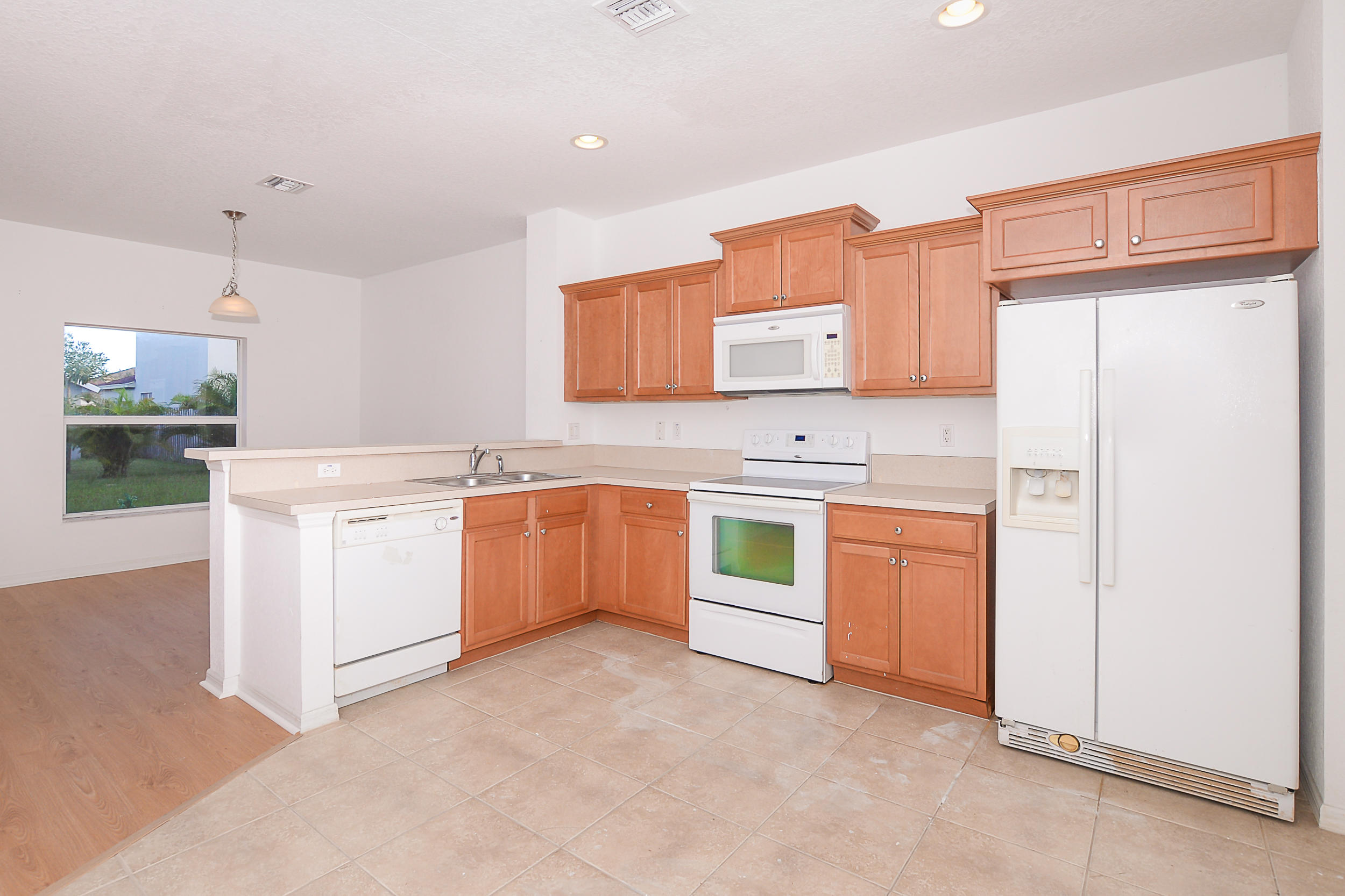 9434 Windrift Circle Fort Pierce, FL 34945 - Photo 9 of 37 Kitchen