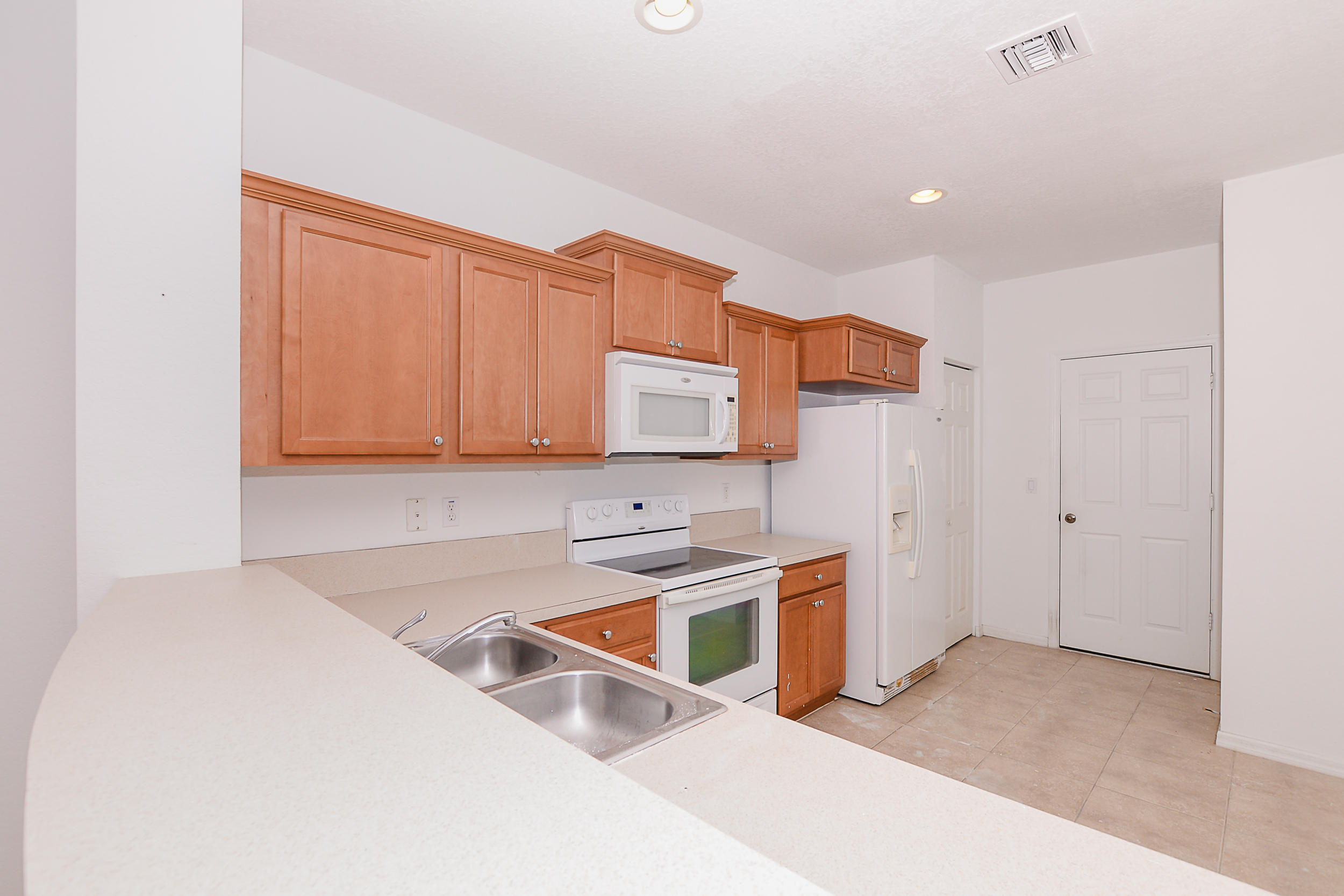 9434 Windrift Circle Fort Pierce, FL 34945 - Photo 10 of 37 Kitchen