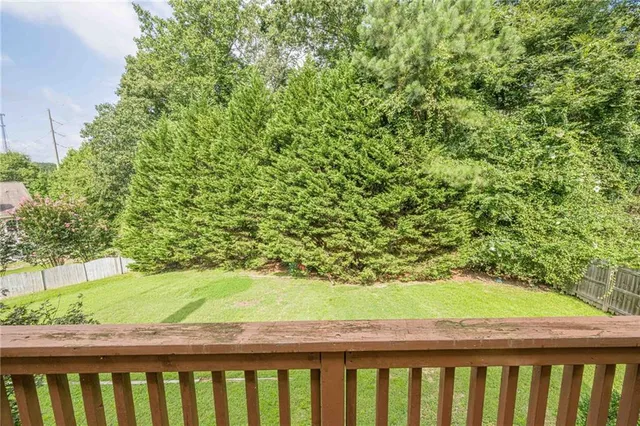 a view of a balcony with an outdoor space