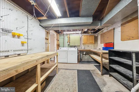 a bathroom with a tub and a sink