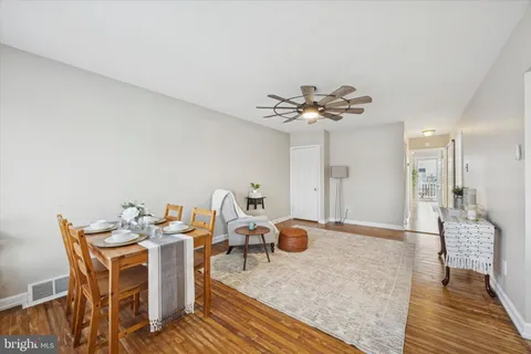 a view of a dining room with furniture