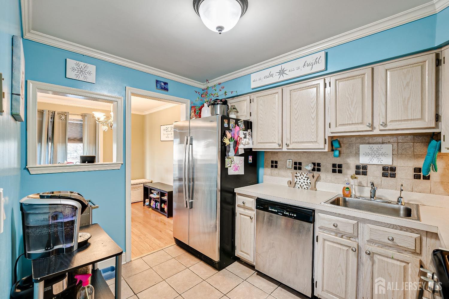 409 North Lafayette Road, Unit 409 Metuchen, NJ 08840 - Photo 13 of 24 a kitchen with stainless steel appliances granite countertop a refrigerator sink and cabinets