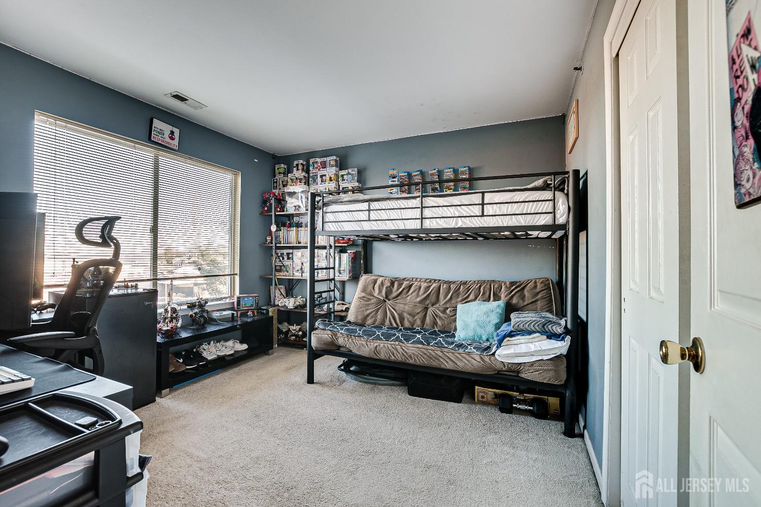 409 North Lafayette Road, Unit 409 Metuchen, NJ 08840 - Photo 20 of 24 a bedroom with bed and a window